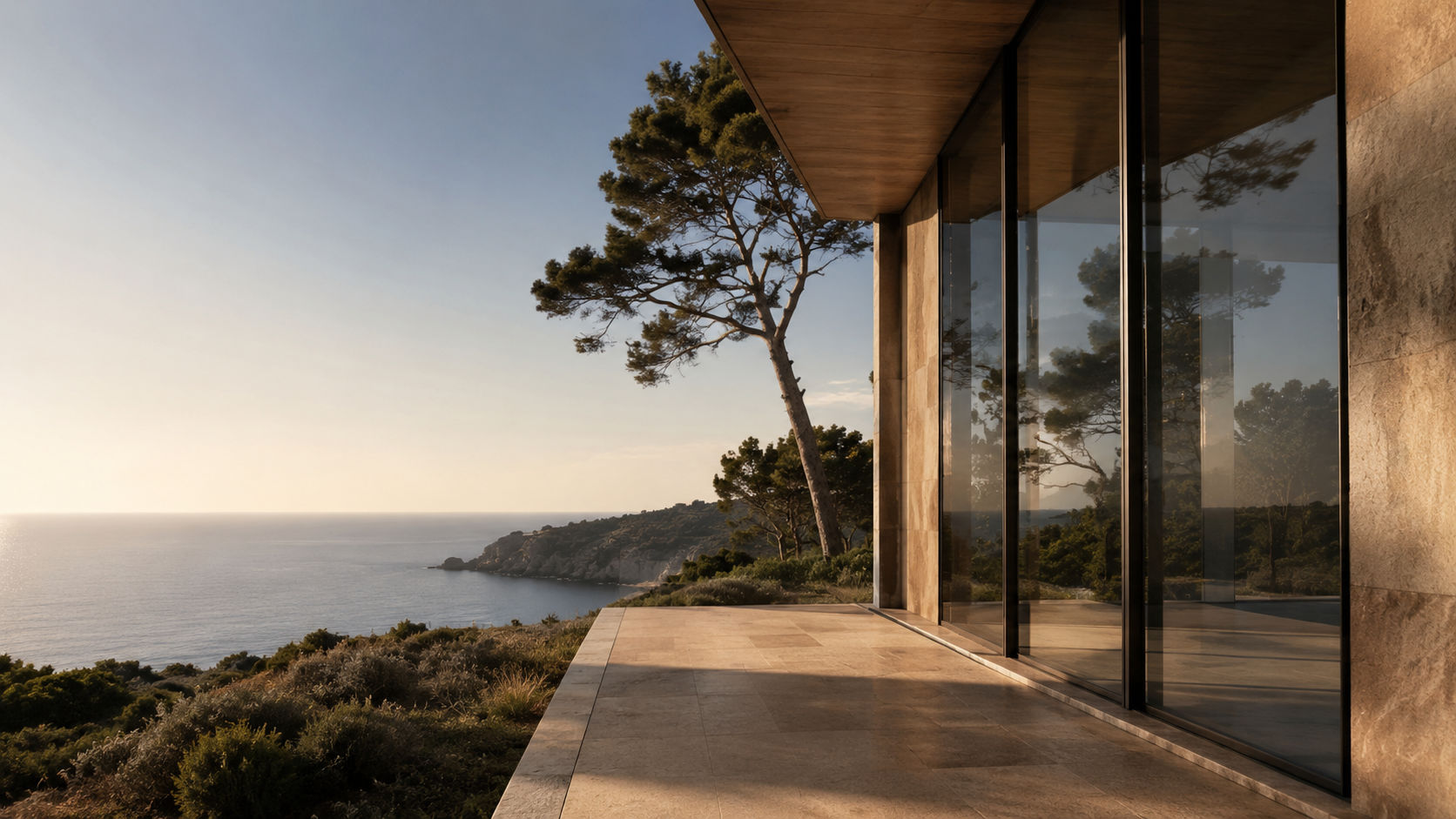 Coastal glass house at golden hour